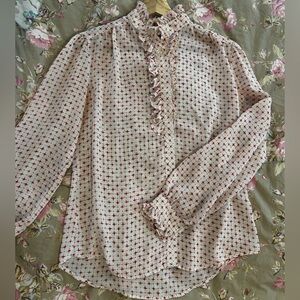 Shapely Ruffled Blouse w Cute Starburst-like pattern